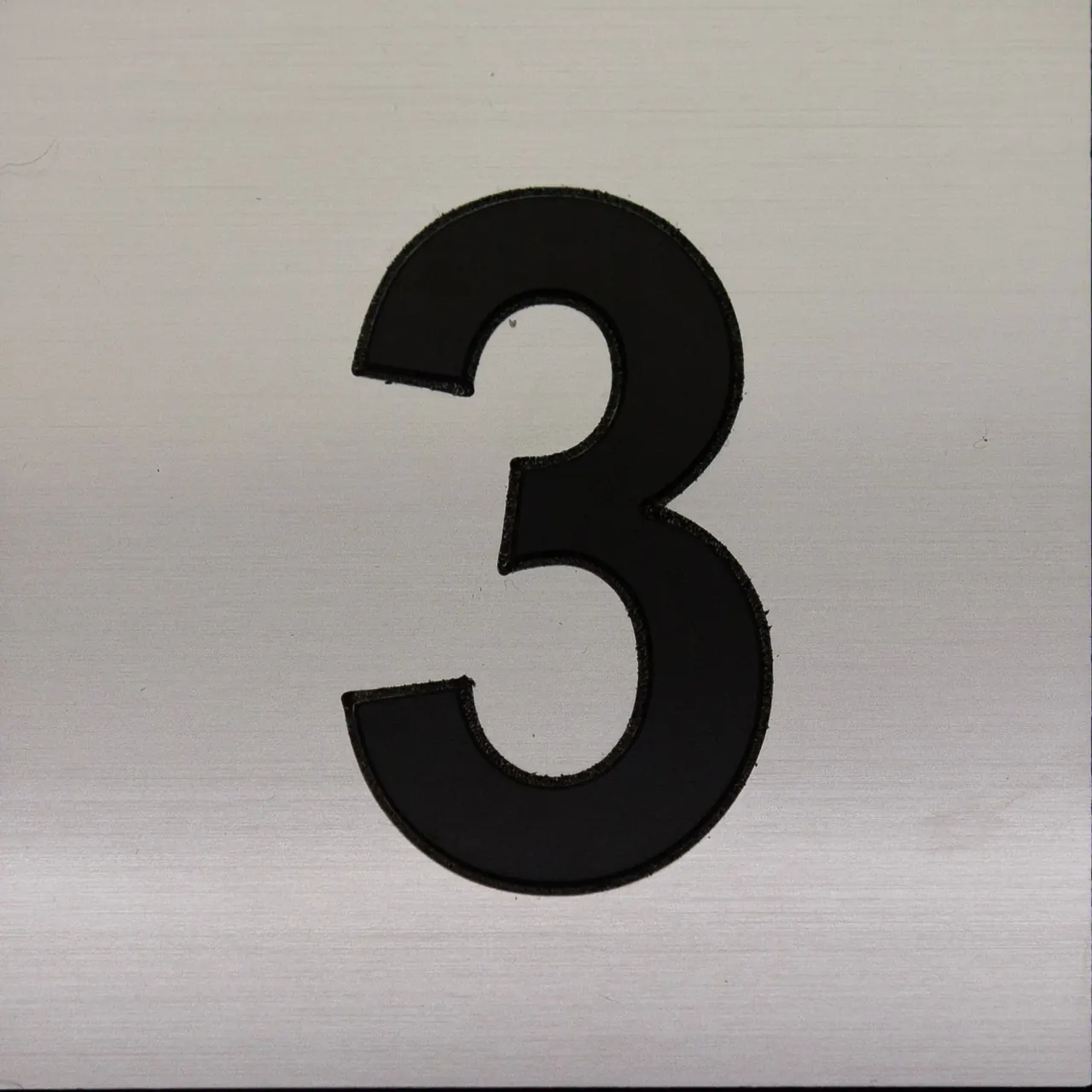 Large brushed aluminium number 3 sign