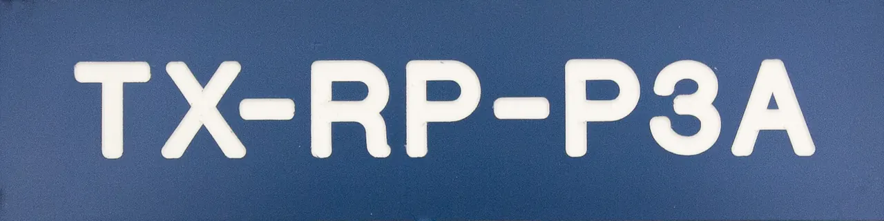 Blue lamacoid equipment tag reading TX-RP-P3A